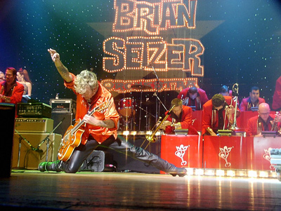 BID ON THE CHANCE TO SEE THE BRIAN SETZER ORCHESTRA'S CHRISTMAS ROCKS! EXTRAVAGANZA @ THE GIBSON AMPHITHEATRE!!!